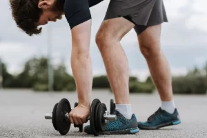 men with dumbel exercise